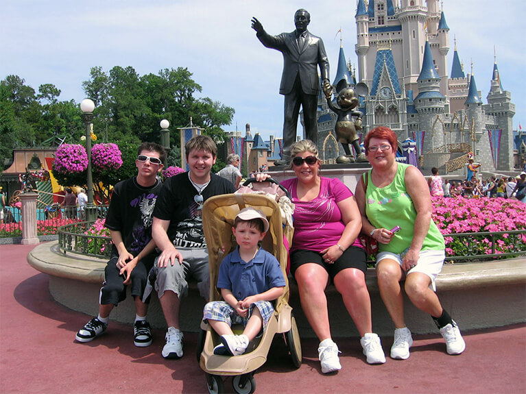 Dis and Hers Family at Partners Statue Magic Kingdom (2010)