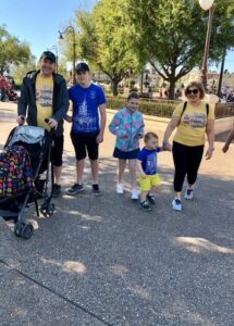 Lauren Hersey at Disney World with Family wearing matching Disney outfits